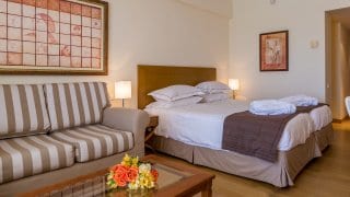 slaapkamer Neptune Luxury Resort